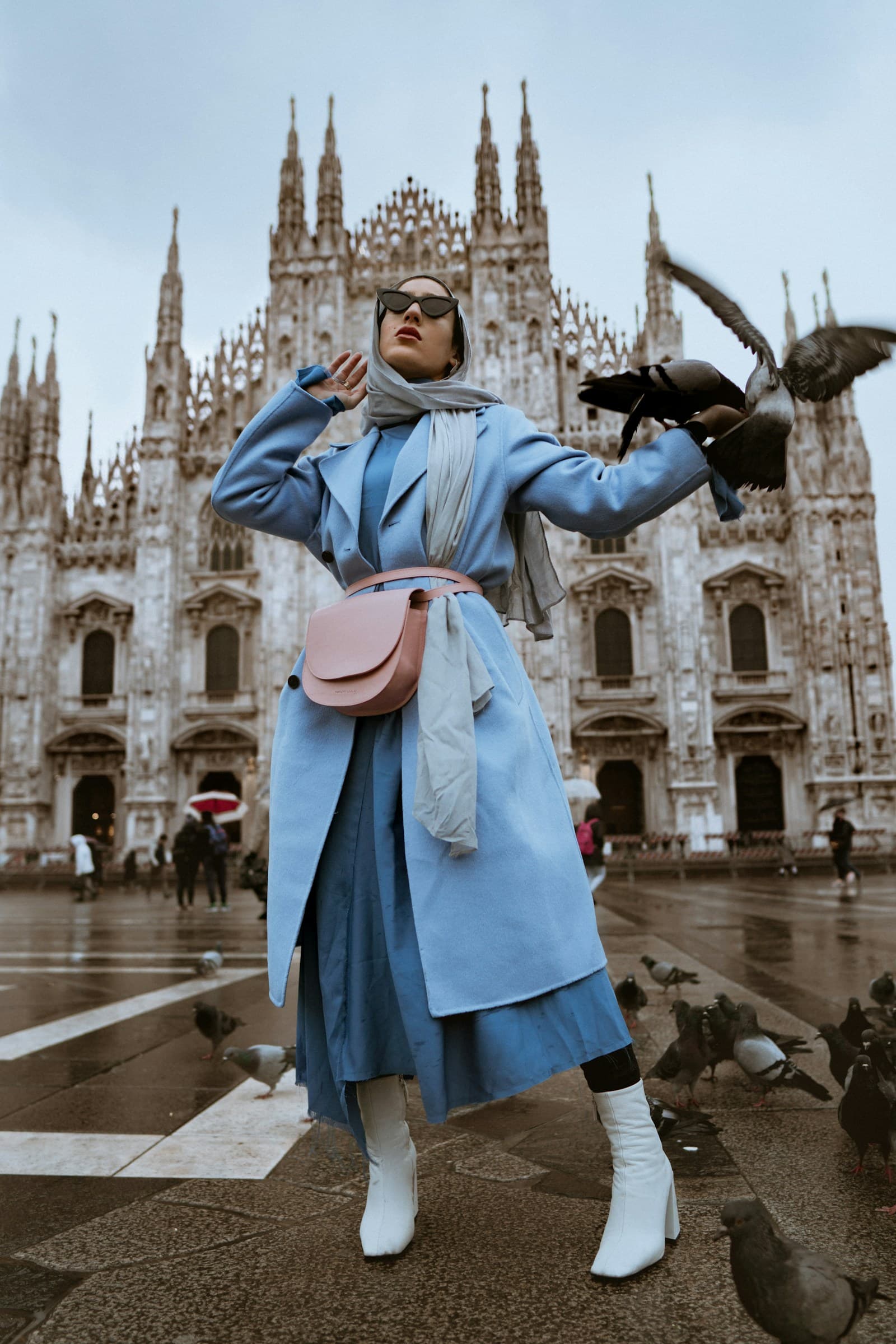 Editorial fashion portrait in a blue coat, illustrative stock photography